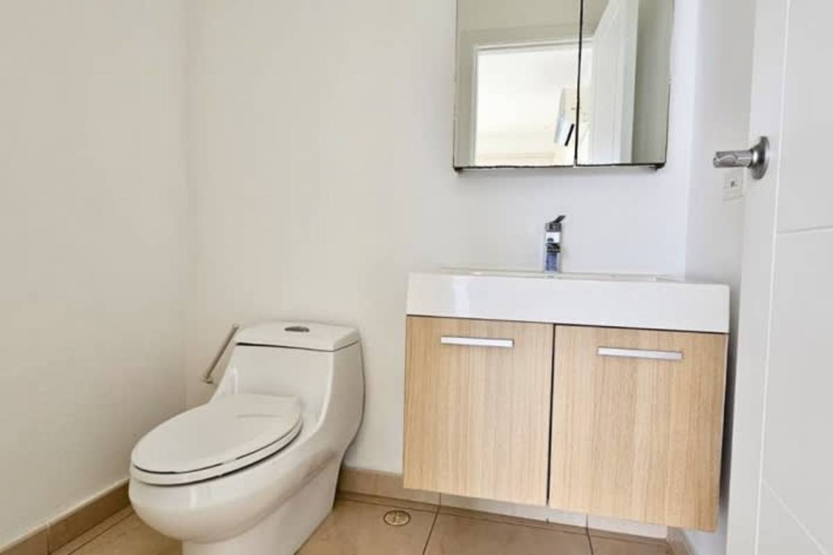 Modern kitchen with granite counters and stainless steel in PH Waters on the Bay Panama City