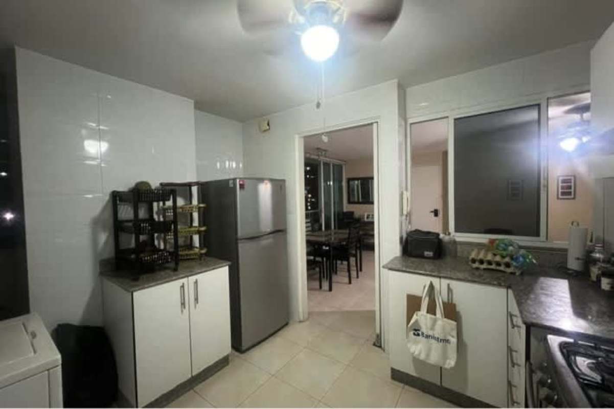 Ceramic-tiled bathroom with modern vanity and shower in PH El Mare Panama City