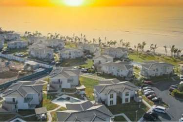 Sunset aerial view of PH Brisas de Mar at Playa Caracol with ocean and tropical landscape Panama