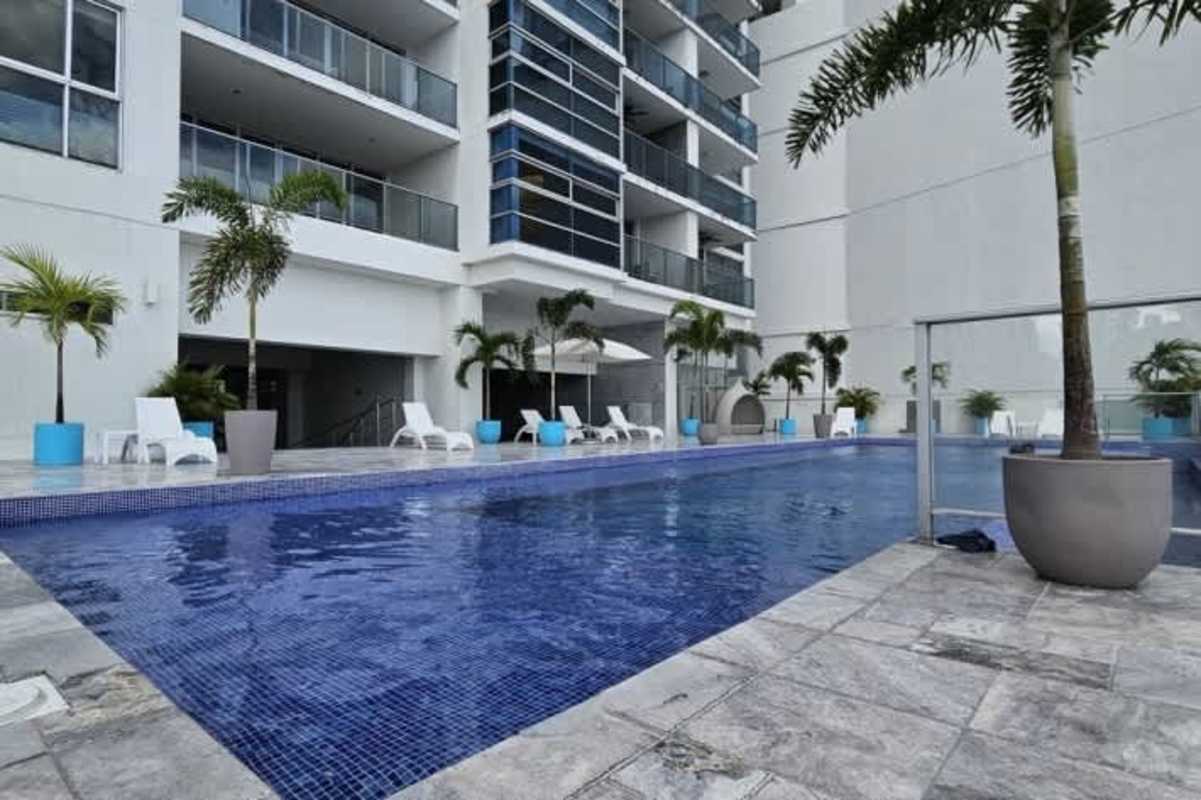 Rooftop basketball and soccer court overlooking ocean skyline at PH Waters on the Bay Panama