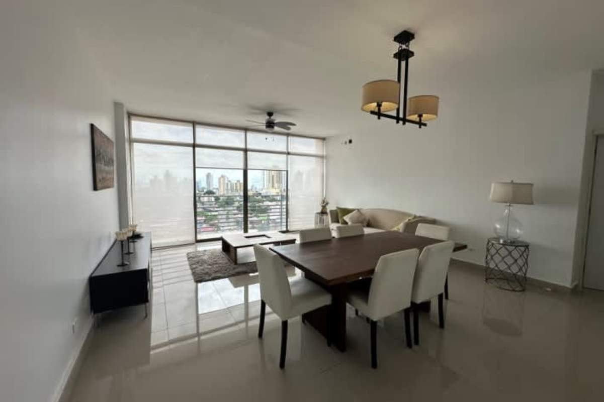 Kitchen with granite countertops, white cabinets, stove, microwave in PH Alfa Betania Panama