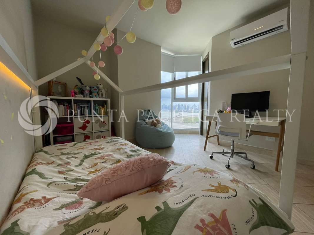 Bright children’s bedroom with panoramic window and city views at The Regent Costa del Este Panama City