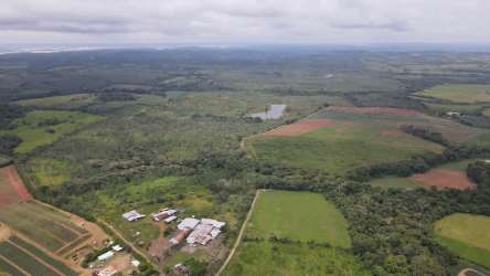 Extensive farmland with solar panels amid countryside landscape in Panama Oeste