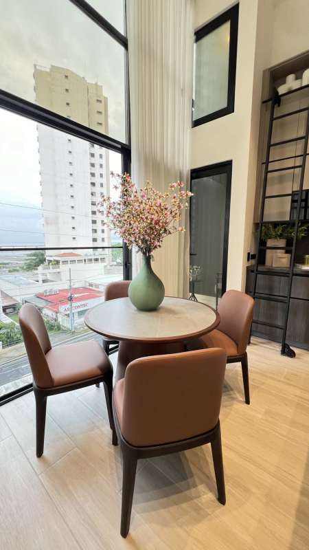 Modern dining space with panoramic windows PH Arcadia Coco del Mar Panama