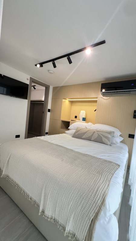 Mezzanine loft bedroom with built-ins modern design PH Arcadia Coco del Mar