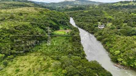 Aerial landscape of 10.8 hectares land with river border near Boquete Panama for agricultural and ranching