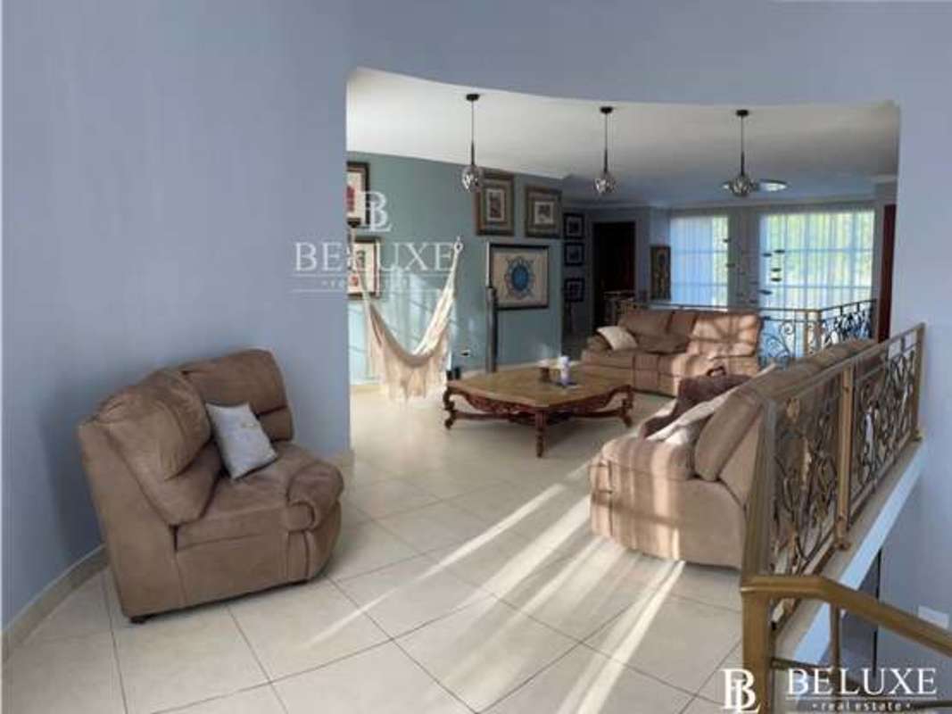 Elegant Mediterranean style entrance with columns double door Los Ríos home Panama