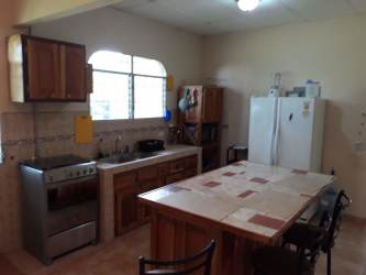 Laundry room with washer hookup water pump and extra storage in house Santiago Panama