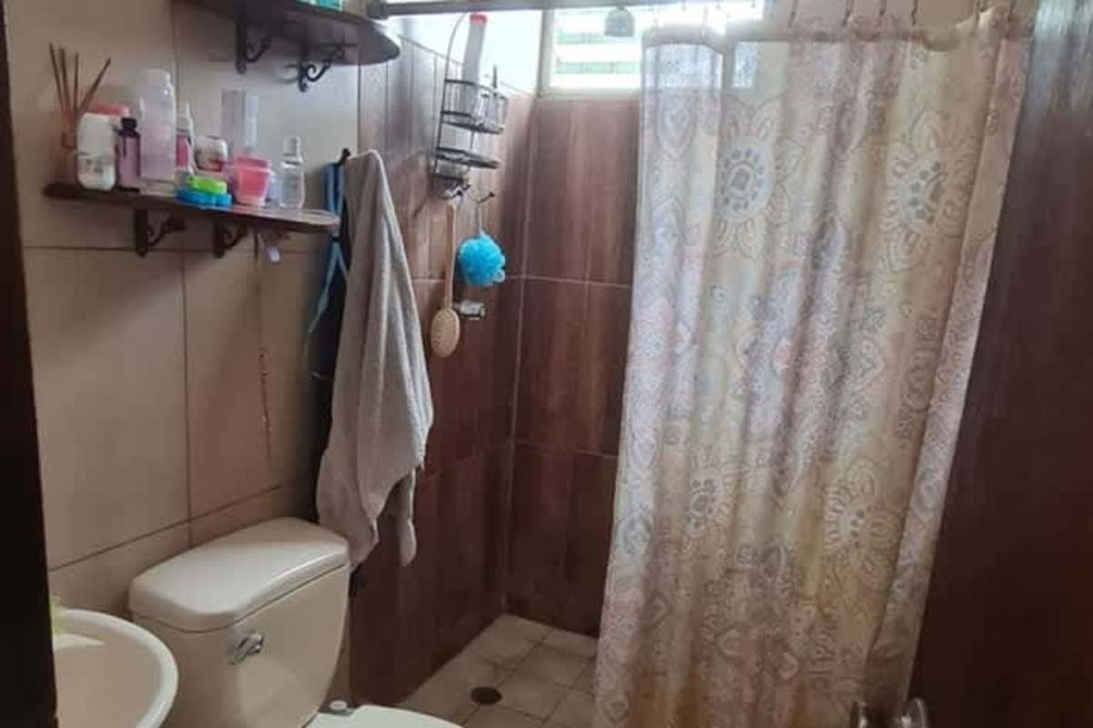 Traditional bathroom with beige tiles bathtub shower Betania Panama real estate