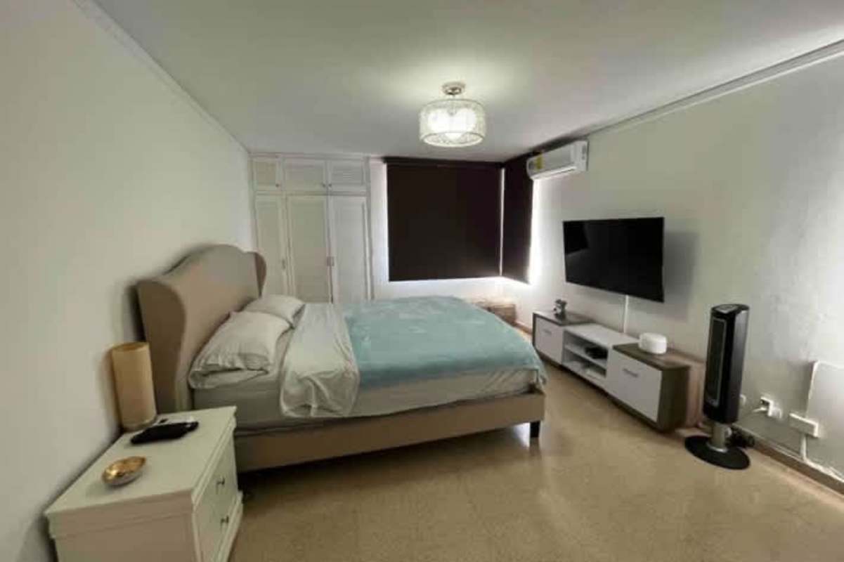 Modern bedroom with wardrobe AC and partial oceanview in PH Bayside Punta Paitilla Panama