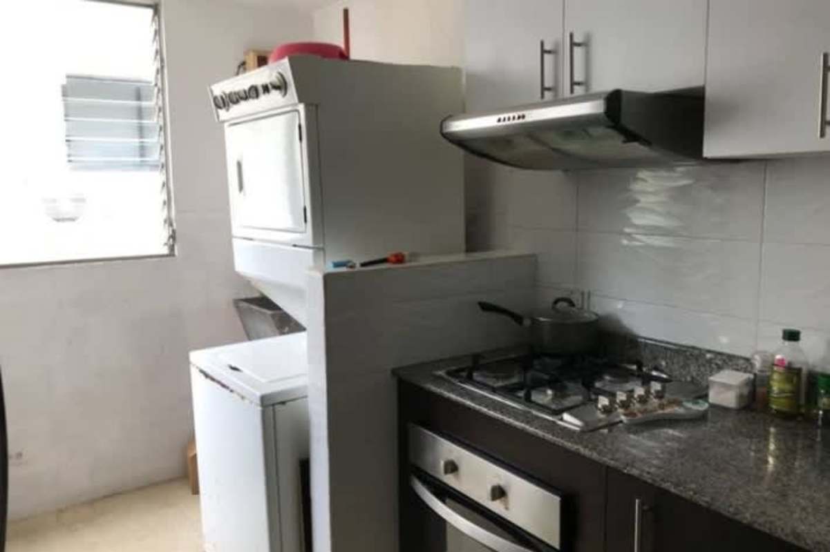 Kitchen with granite counter, gas stove, integrated laundry PH Bayside Panama