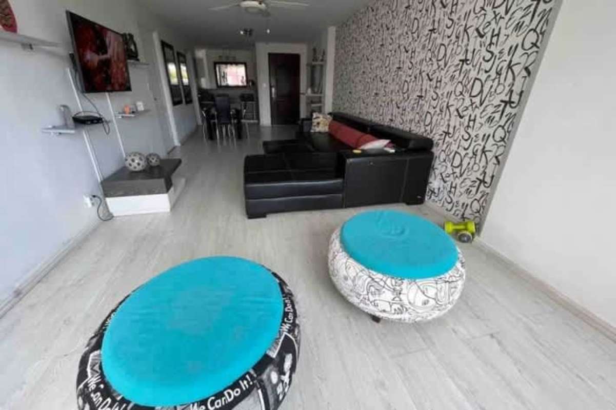 Living dining room with accent wall ceiling fan modern furniture PH Bayside Paitilla Panama