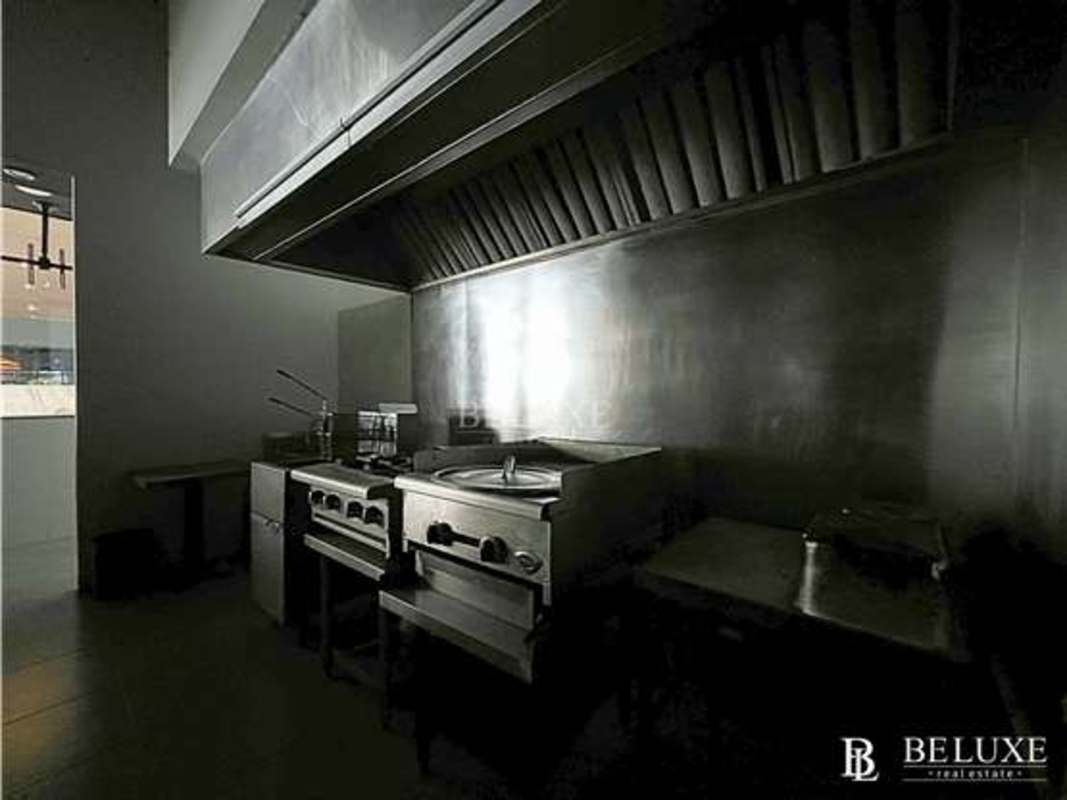 Commercial kitchen gas stove industrial exhaust stainless steel countertops restaurant in Panama City