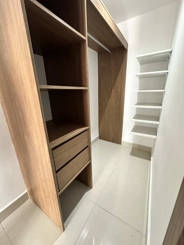 Modern bathroom with glass shower divider and quality tile in PH Worldwide Plaza apartment Panama City