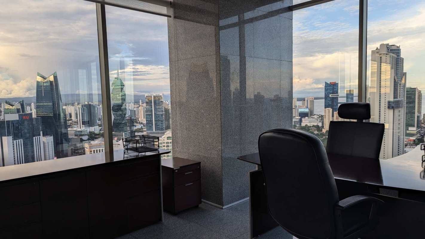 Divided office spaces with glass partitions panoramic city views PH BICSA 41st floor Panama