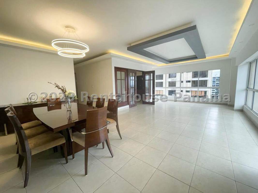 Bright dining space with modern finishing, tile floor, big windows in PH Victoria Tower Obarrio Panama