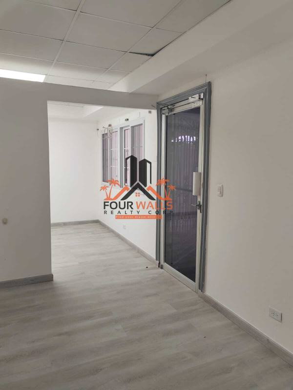 Large meeting space with white walls, laminate floor, recessed lighting commercial house El Dorado