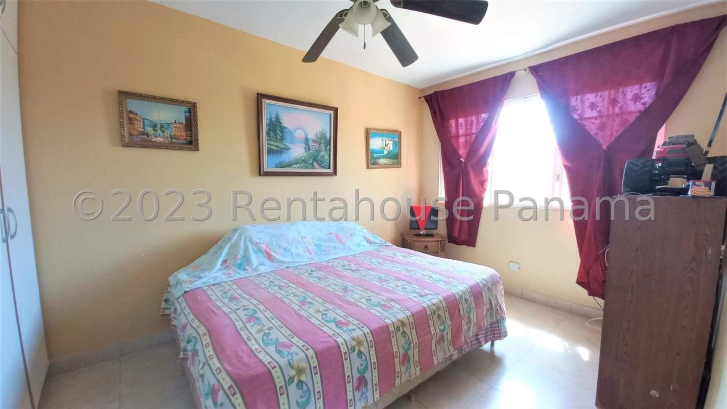 Spacious master bedroom tile floor ceiling fan large windows PH Villa Lido Brisas del Golf