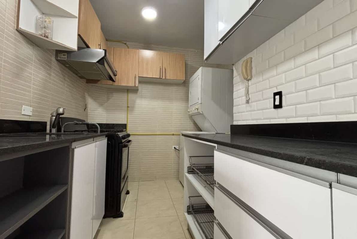 Compact galley kitchen with granite counters washer dryer PH Albrook Point Clayton Panama