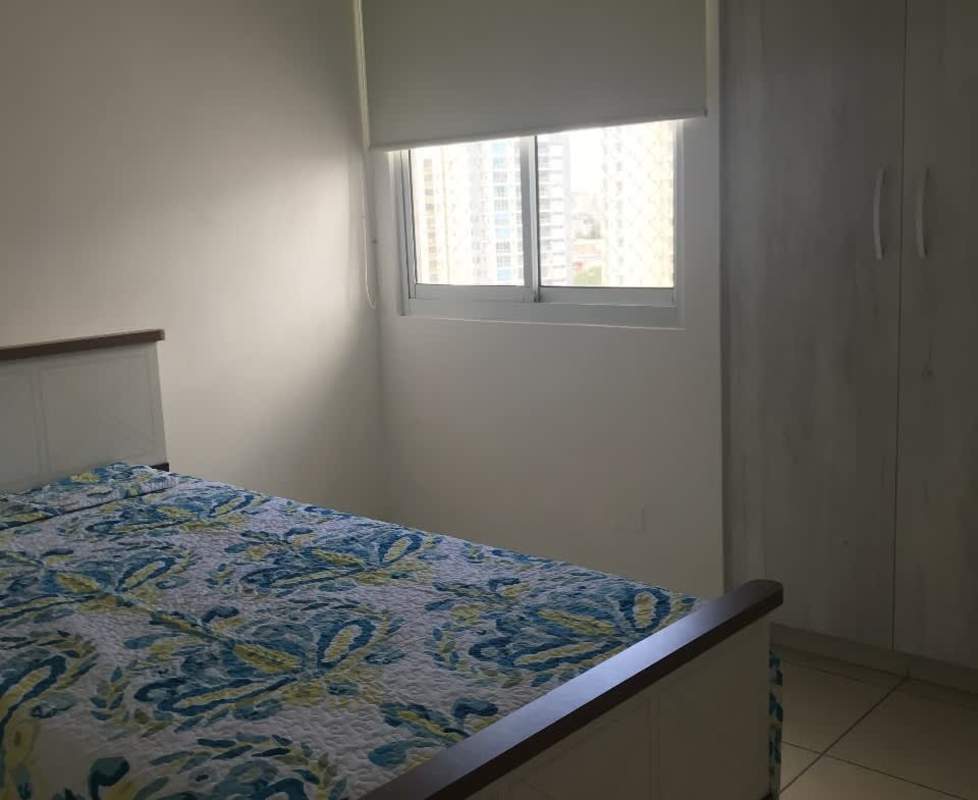 Bedroom with large wardrobe and window overlooking city PH Cangrejo Central Panama