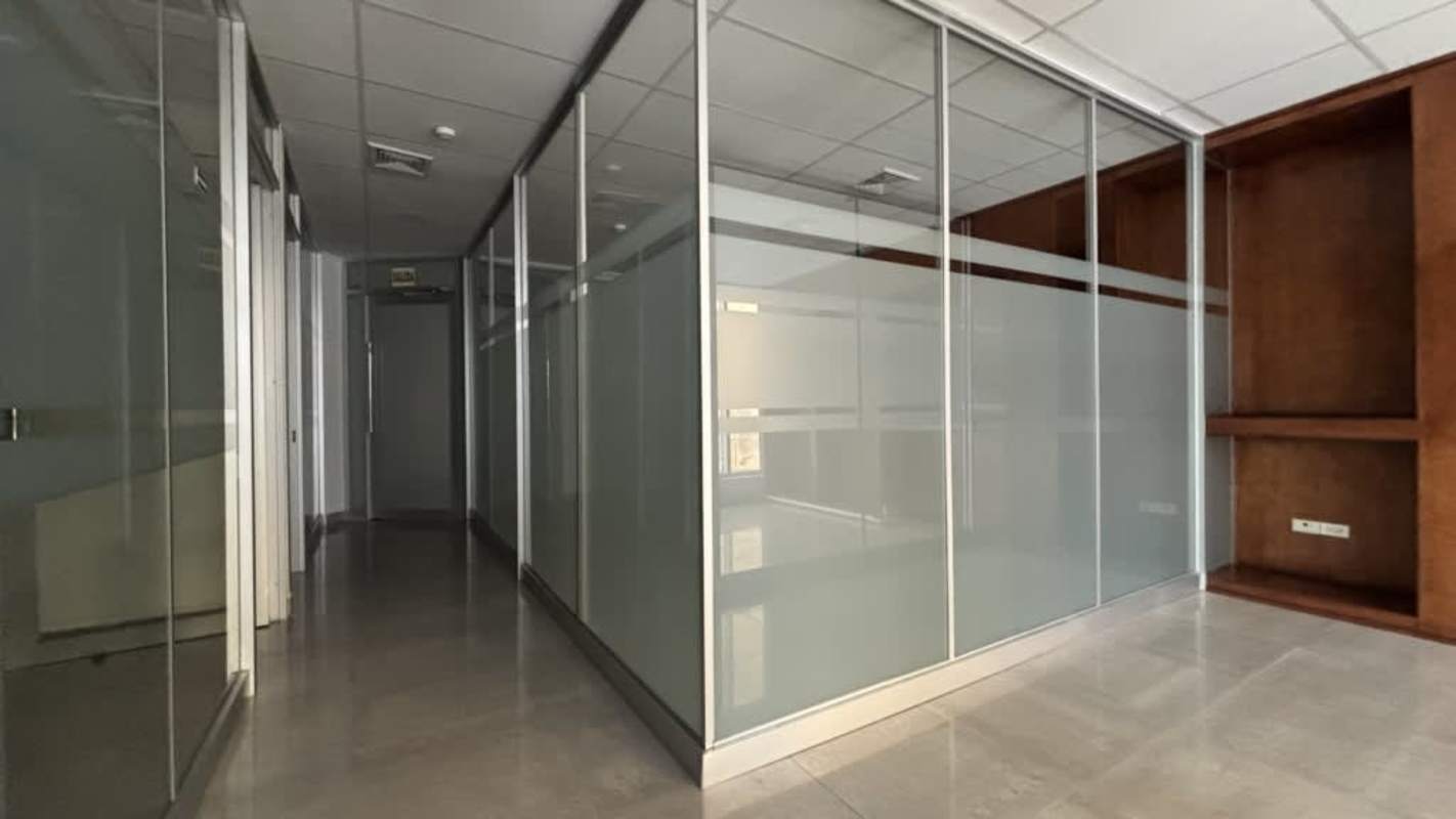 Elevator lobby with multiple elevators and reflective tile flooring Ocean Business Plaza Panama