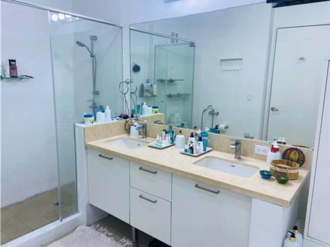 Modern bathroom with large soaking tub, tile finishes in luxury condo PH Dupont Panama City