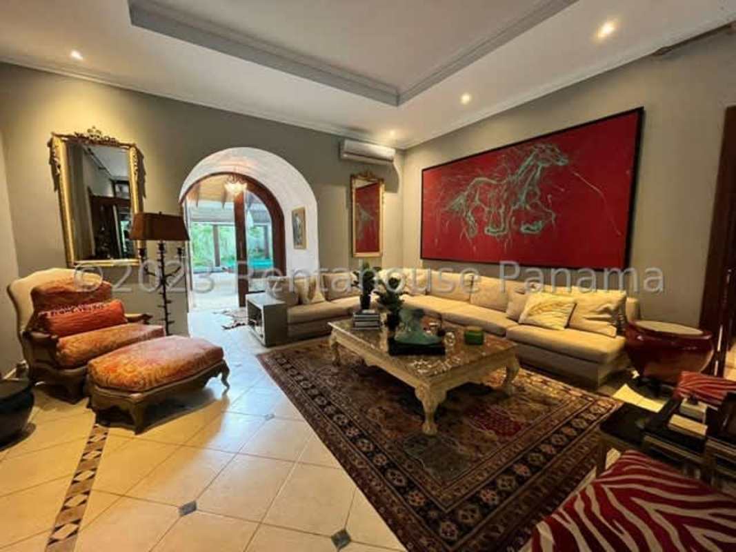Living room with arches, artwork, upscale home Altos del Golf Panama rental