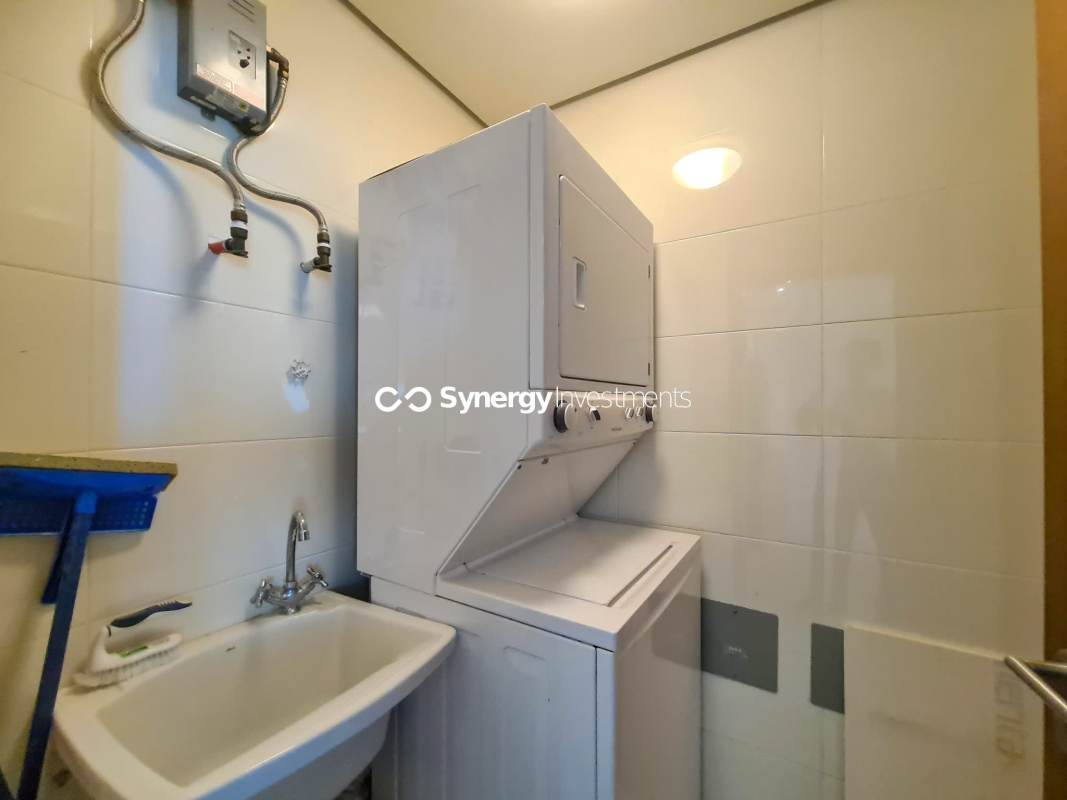 Elegant building double height lobby with designer furniture at PH Parkside Costa del Este Panama City