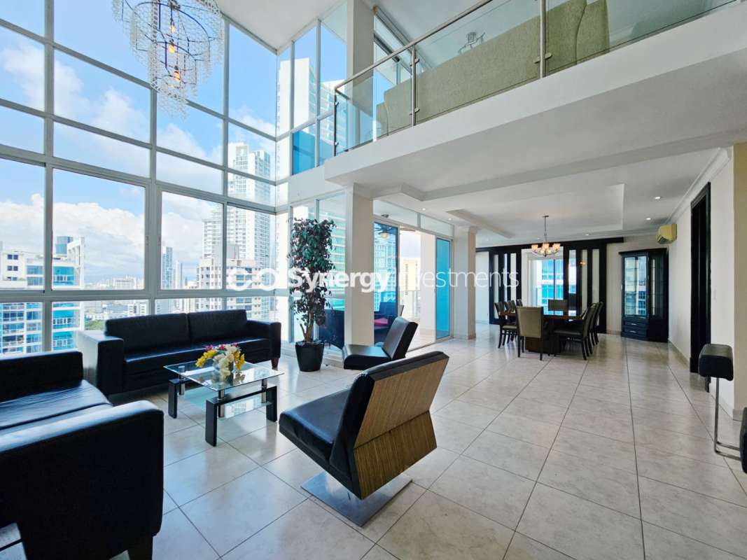 Modern kitchen with granite counters, stainless appliances, large windows in PH Waters on the Bay Panama