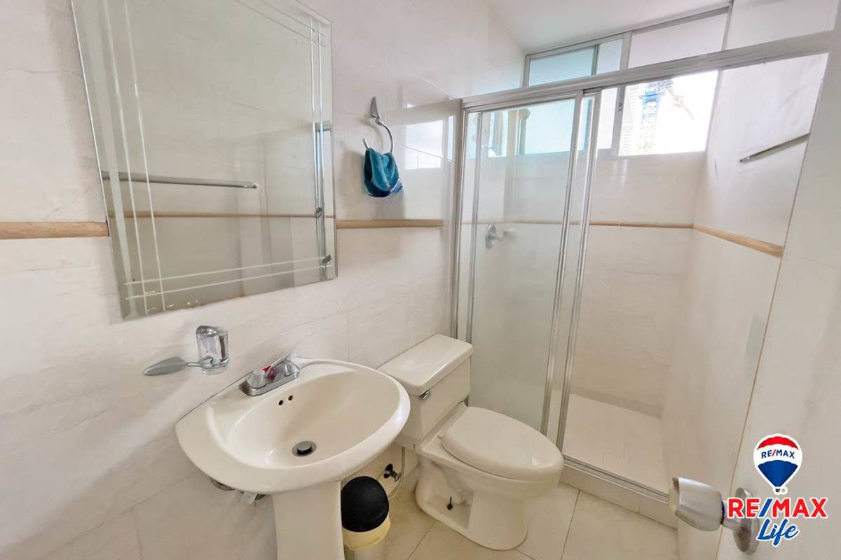 Open plan living dining with large windows and ocean views PH South Beach Bella Vista Panama City