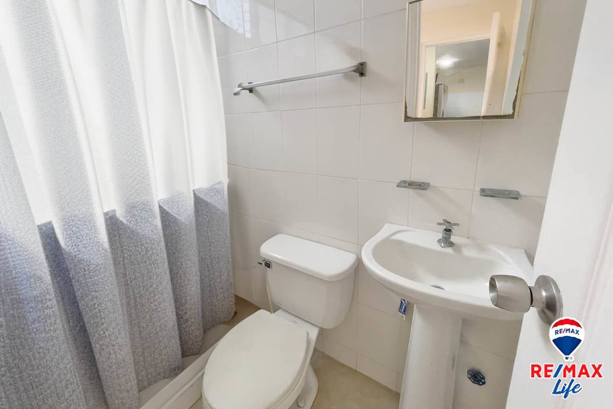 Modern bathroom with glass enclosed shower PH South Beach Panama City