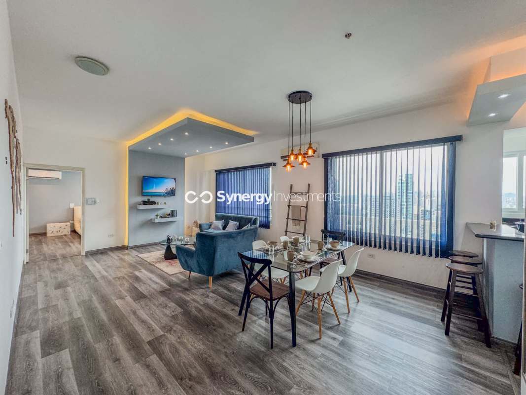 Remodeled bathroom glass-enclosed shower marble countertop PH Yacht Club Panama