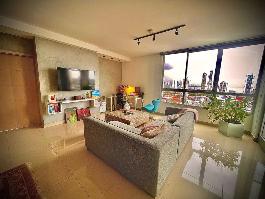 Double height lobby with green wall and modern furniture PH South Coast Panama