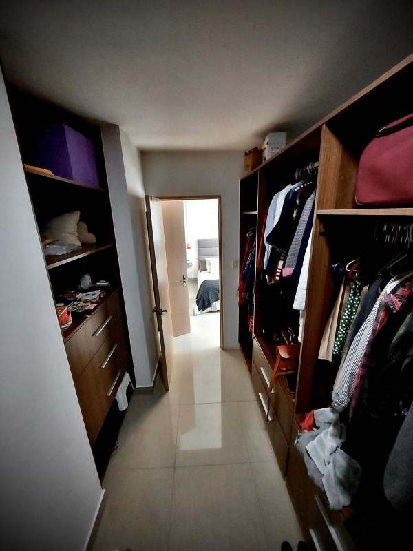 Built-in shelves and racks in walk-in closet PH South Coast Panama