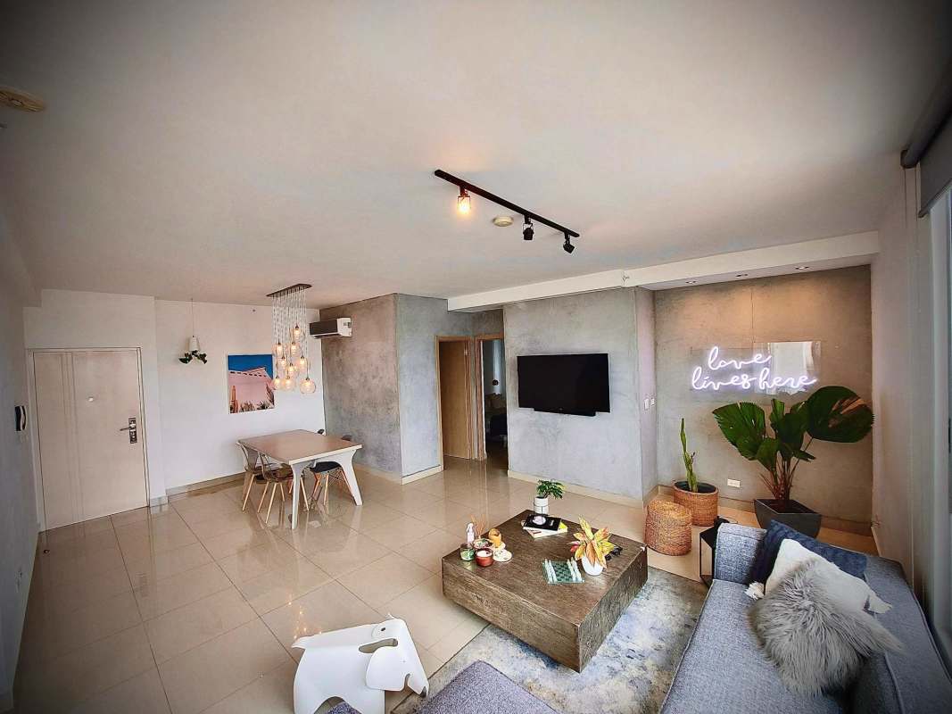 Modern open living and dining space with natural light PH South Coast Panama