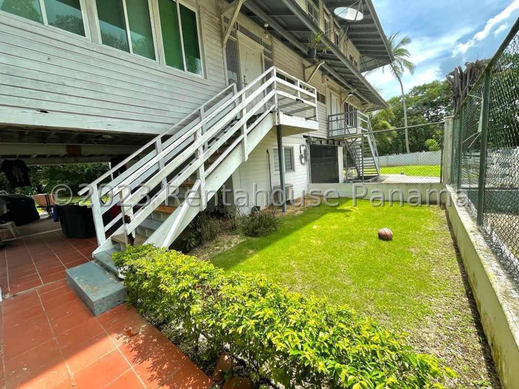 Colonial tropical house with terrace and green garden in Balboa Clayton Panama