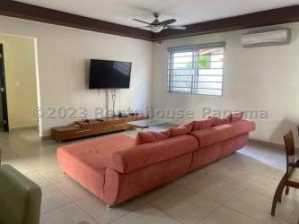 Contemporary kitchen with Italian quartz countertops, island, wood cabinets in PH Palmia Panama Pacifico