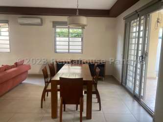 Spacious master bedroom with closet, large window, neutral walls in PH Palmia, Woodlands