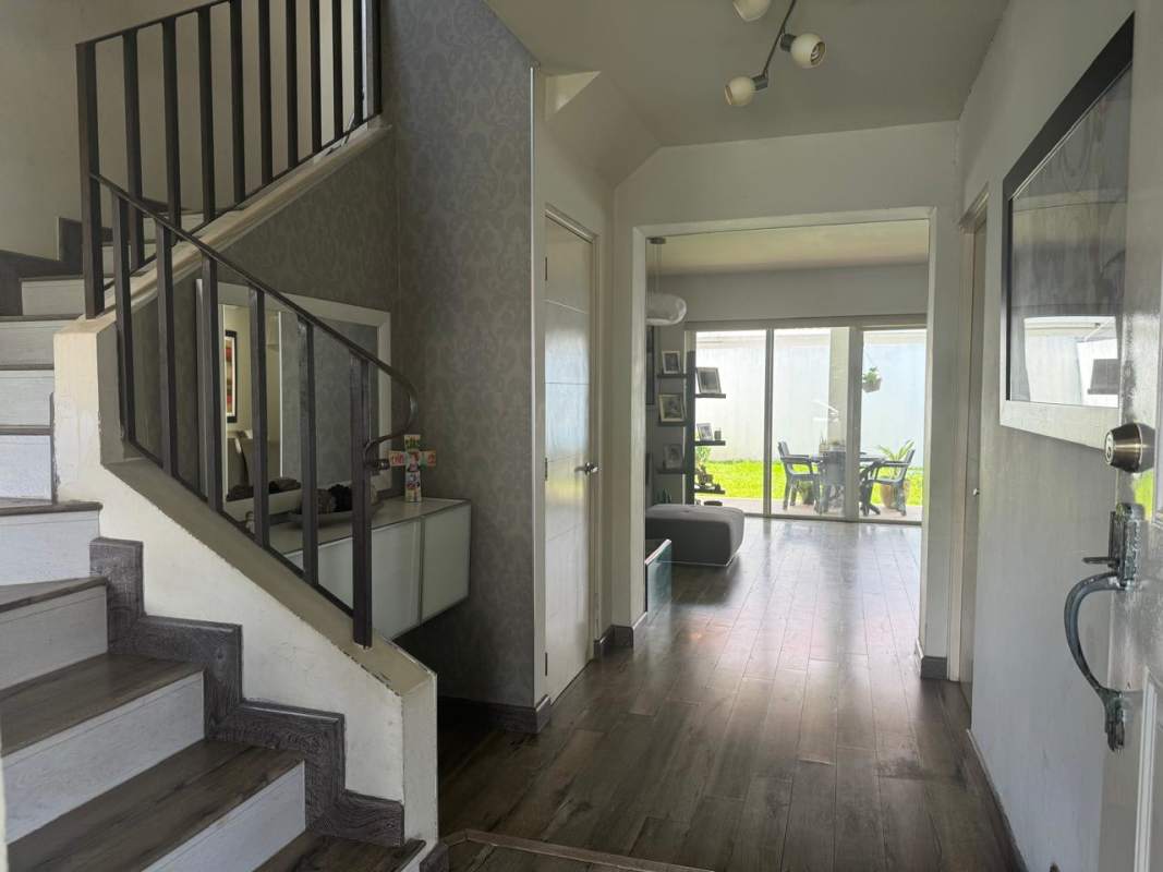 Bathroom with stone tile walls, vanity, mirror Quintas de Versalles Costa Sur Panama