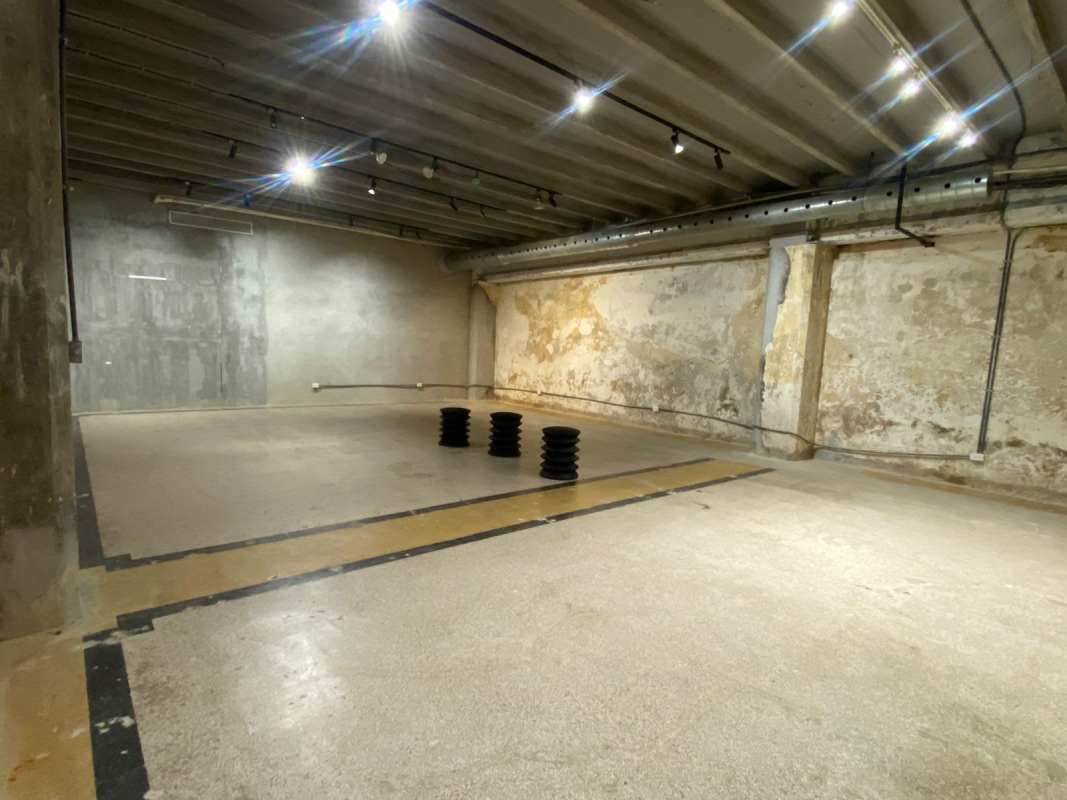 Raw industrial parking or storage basement inside Edificio Heurtematte Casco Antiguo