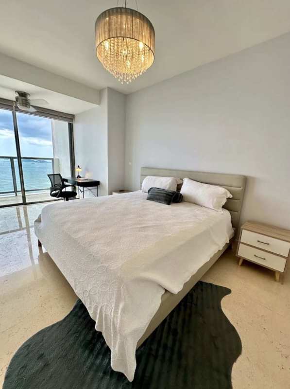 Elegant bedroom with balcony ocean view, floor-to-ceiling glass PH Yoo Panama apartment