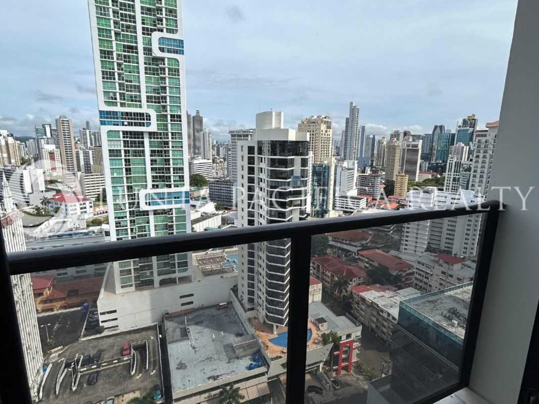 Balcony overlooking modern Panama skyline from The Gray apartment tower