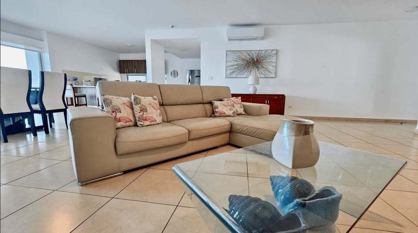 Modern kitchen with granite countertops and appliances in Oasis on the Bay Punta Pacifica Panama