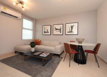 Swimming pool area with palm trees and sun deck Parterre Panama Pacifico