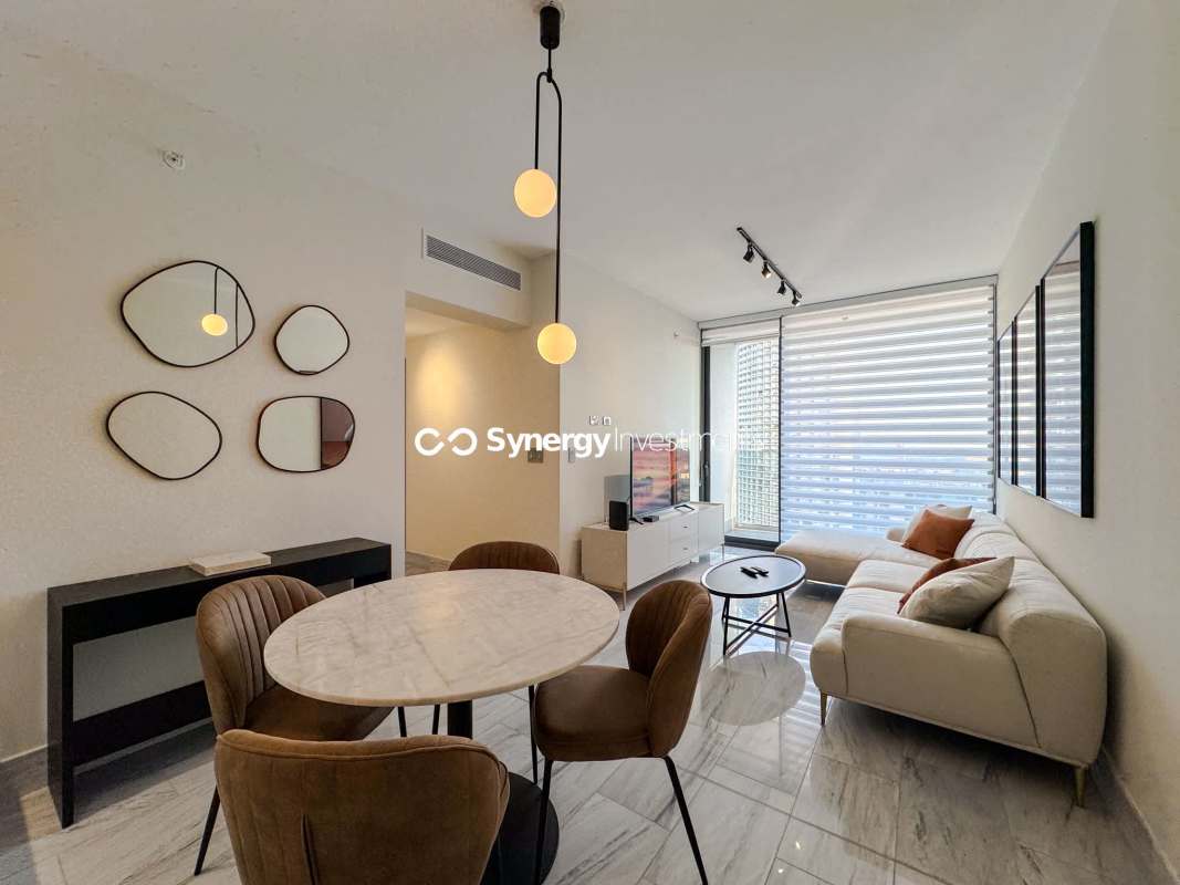 Modern open kitchen with designer finishes marble floors Nuovo Armani Casa in Panama