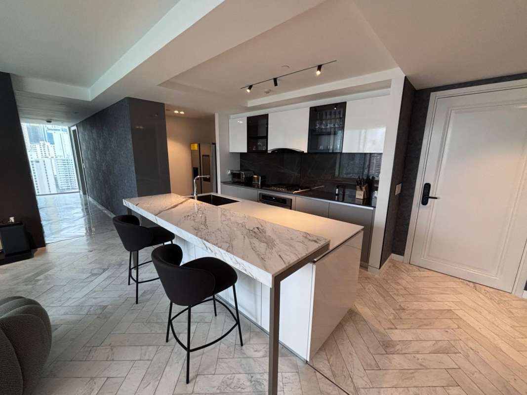 Spacious master bedroom with floor-to-ceiling windows, ocean and skyline views, PH YOO Panama