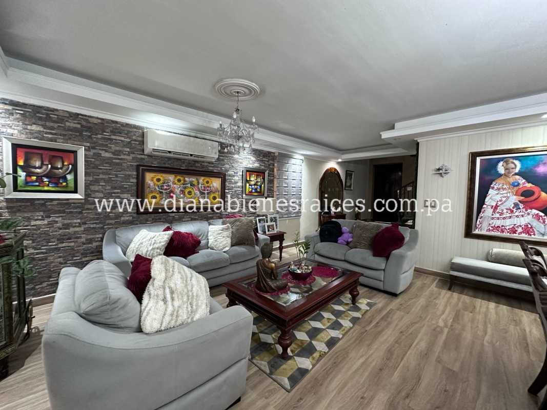 Kitchen with granite countertops, stainless appliances, wood cabinetry house Condado del Rey Panama