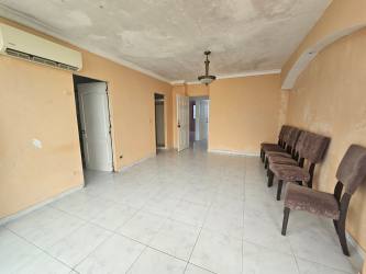 Modern lobby with marble decor and elevators PH Ocean Plaza Colón City Panama