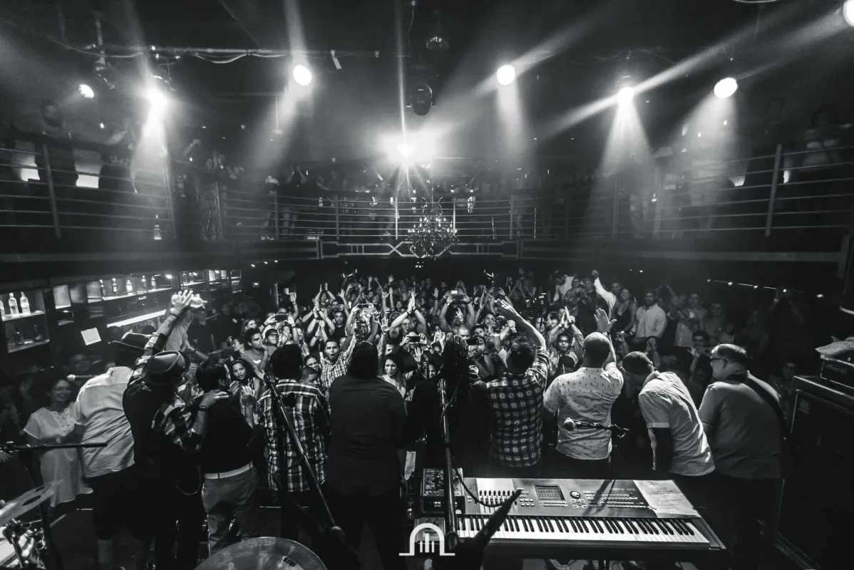 Two-level balcony nightclub setup with chandelier at Teatro Amador Casco Viejo Panama