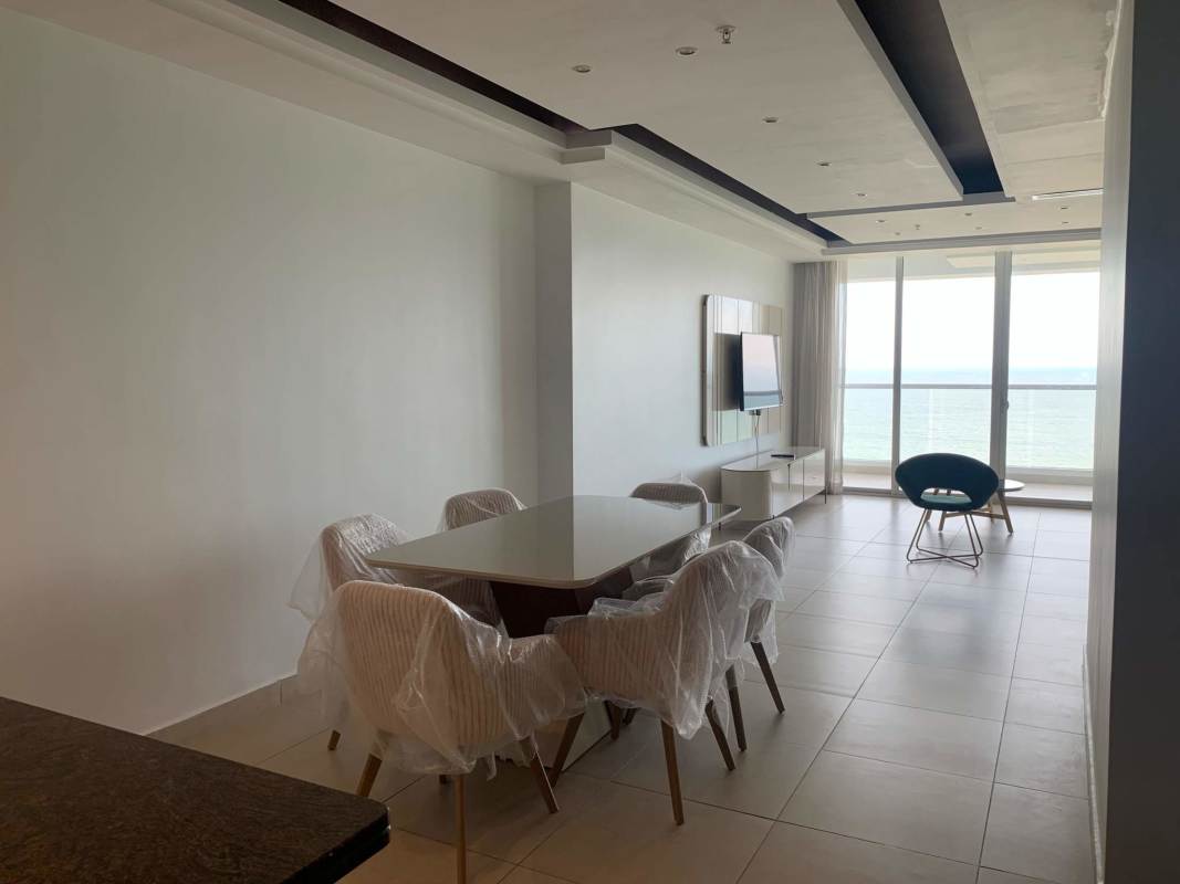 Spacious living dining area with ocean view balcony PH Rivage Panama City